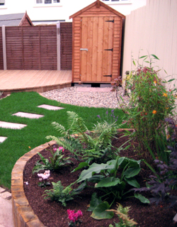 Raised Beds, Decking and lawn stepping stones